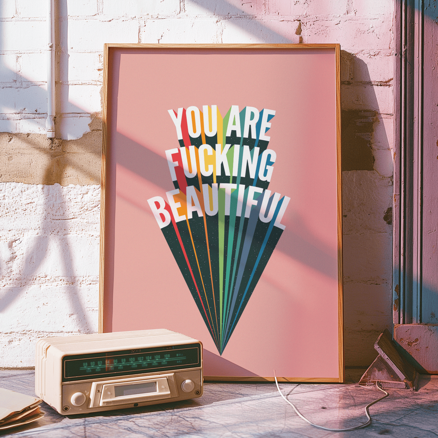 Retro inspired print with YOU ARE FUCKING BEAUTIFUL, written in white, capital letters with a black drop-shadow and starry overlay, and multi-coloured highlights, on pink background, lovers gallery wall art print